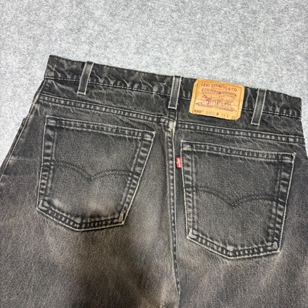 Vintage Levis 550 Relaxed Fit Tapered Leg Black Faded Jeans M 33x32 Made in USA
